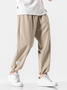 Large casual trousers sweatpants tied to the feet of nine-point pants